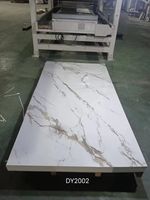 Vente en gros de matériel de décoration panneau mural en PVC feuille de marbre en PVC brillant panneau de marbre UV design d'intérieur de maison 1220*2440 3mm 2mm