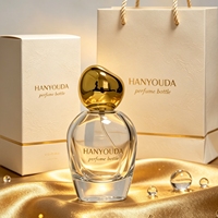 Flacon de parfum en verre transparent 50ml 100ml avec bouchon irrégulier en forme de galet, capuchon doré/argenté/marron/nickel, pulvérisateur à pompe, gravure personnalisée du logo de la marque