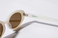 Fabrication de lunettes de soleil en acétate respectueuses de l'environnement BIO ECO Biodégradables Lunettes de soleil ovales œil de chat blanc lait elliptiques