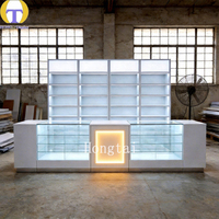 Comptoirs d'exposition et vitrines à tabac modernes et personnalisés avec éclairage LED pour magasins de détail et showrooms, respectueux de l'environnement