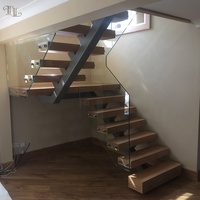 Escalier central moderne Tanlong en bois avec garde-corps en verre sans cadre, escalier industriel à marches ouvertes sur mesure