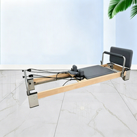 Reformer de Pilates en bois haut de gamme, durable et de haute qualité, avec conception sécurisée et garantie de 3 ans pour une utilisation en salle de sport, de yoga ou de studio de Pilates
