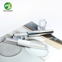 Tube de brillant à lèvres double embout transparent et électroplaqué au design populaire, emballage cosmétique vide en plastique en gros