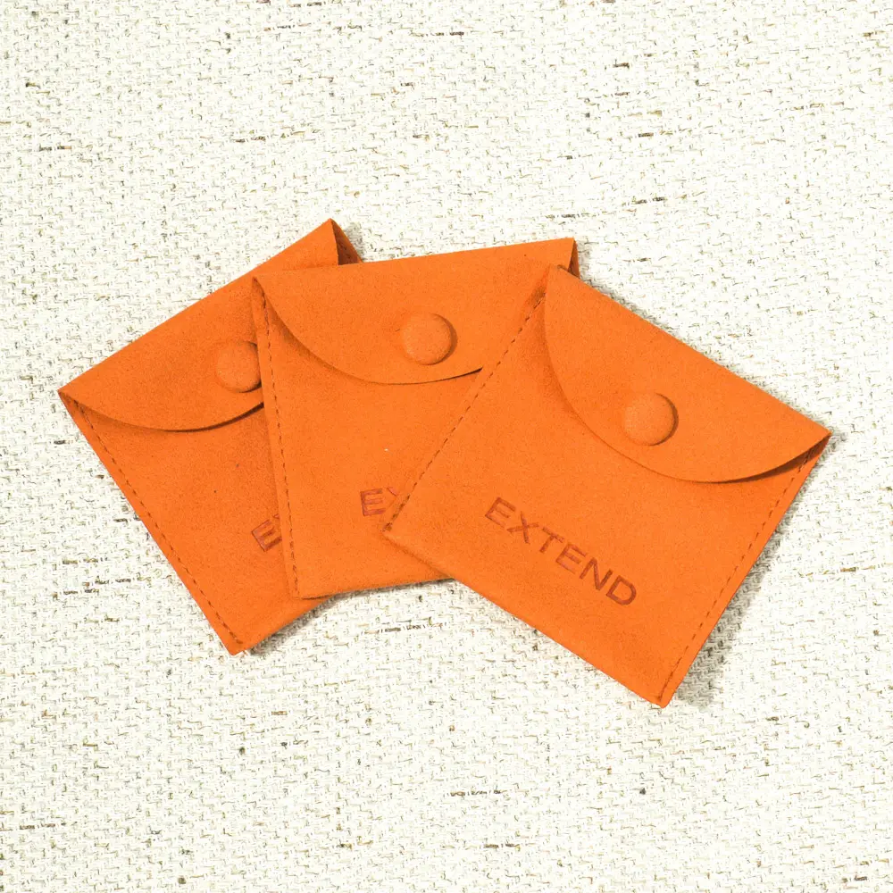 Commercio all'ingrosso personalizzato Logo orecchini collana stampata in microfibra Mini arancione con bottone marsupio gioielli