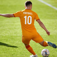 Maillot de football orange élégant à séchage rapide, directement de l'usine, avec logo personnalisé, pour équipe sportive, vêtements de football imprimés