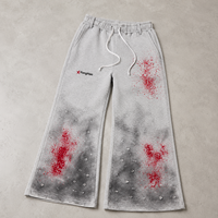 Fabricant de vêtements personnalisés OEM ODM : Pantalons de survêtement larges pour hommes, effet délavé vintage, imprimé graphique, style streetwear