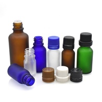 Bouteilles d'huile essentielle en verre ambré clair bleu givré rondes de 5 à 100 ml pour l'huile de massage, emballage cosmétique