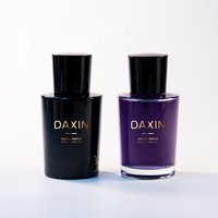 Vente en gros de flacons de parfum vides de 50ml design de luxe pulvérisateur à pompe de sérigraphie en verre noir diffuseur d'emballage OEM unique