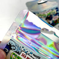 Sachet holographique personnalisé de haute qualité avec fente Euro et fermeture éclair refermable pour l'emballage de bonbons à la mousse de mer
