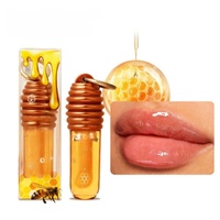 Huile à lèvres hydratante brillante à l'extrait de miel, personnalisable OEM/ODM, avec boucle de suspension, pour maquillage de beauté