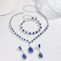 Elegante Conjunto de Tres Piezas de Aretes, Collar y Pulsera con Pedrería Azul Agua, Chapado en Plata/Aleación de Oro Puro, Regalo de Compromiso