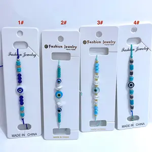 Vente en gros vente directe personnalisée yeux de verre tissés à la main bracelets porte-bonheur coquille bohème mer