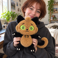 Service de conception de produits en peluche personnalisés pour poupée personnage Chat Monstre avec yeux spirale brodés, queue recourbée et forme debout
