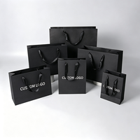 Sacs en papier de luxe noirs personnalisés avec logo, emballage cadeau et shopping écologique pour usage commercial HONPAK