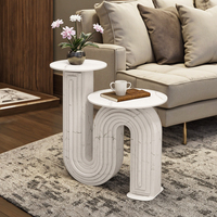 Table basse haute et basse de luxe minimaliste moderne Table basse en dalles de roche courbées pour salon ou petit appartement