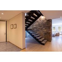Escalier en colimaçon compact sur mesure pour intérieur, fabriqué en Chine, avec marches en bois et balustrade en acier inoxydable, idéal pour optimiser l'espace.