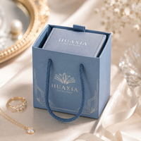 Sac en papier de luxe pour bijoux avec logo pour bagues, colliers et bracelets, prix d'usine, options de taille, de couleur et de finition personnalisées