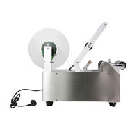 Petite étiqueteuse de bouteilles rondes de bureau semi-automatique à moteur électrique de haute précision