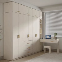 Armoire de chambre blanche moderne avec portes battantes et miroir, sans poignée à bouton