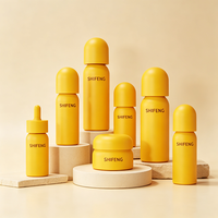 Flacon de sérum anti-âge 30 ml avec bouchon sphérique unique, compte-gouttes en verre, distributeur d'huile pour le visage à la vitamine C de luxe