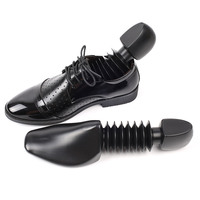 Vente en gros Logo personnalisé Brancard extensible réglable Ensemble d'embauchoirs en plastique noir