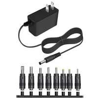 Adaptateur secteur universel mural 12V 2A 24W AC/DC avec 8 embouts DC interchangeables, alimentation stable