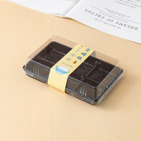 Boîtes d'emballage transparentes en PET à 6 compartiments, idéales pour les produits alimentaires tels que les macarons au chocolat et les desserts.
