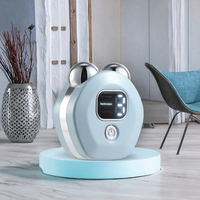 Appareil de lifting du visage et du cou à micro-courant OEM ODM avec matériau ABS, chauffage chaud, resserrement de la peau, masseur facial