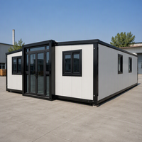 Maison conteneur pliable à double aile extensible, panneau sandwich, structure en acier portable, maison préfabriquée pour une vie temporaire en extérieur