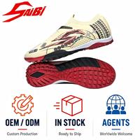 Chaussures de football SAIBI antidérapantes et résistantes à l'usure, semelle en caoutchouc PU, crampons unisexes pour adolescents, entraînement en extérieur, logo personnalisé, vente en gros