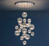 Lampe à suspension en verre bulle minimaliste personnalisable pour lustres à haut plafond dans le hall d'escalier de l'hôtel