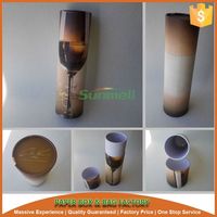 Emballage de verres à vin à bord rouleau imprimé de couleur personnalisée tube cadeau en papier rond recyclable avec couvercle en verre à motif unique en feuille d'argent