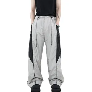 Metro Factory Wholesale Men Wide Leg Nylon Pants Custom Logo Adjustable Leg Joggers Loose Fit Patchwork Nylon Pants Men