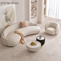 Canapé sectionnel incurvé blanc, style scandinave moderne et luxueux, idéal pour salon, hall d'hôtel ou petit appartement.