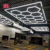 Lumière d'atelier hexagonale LED durable de haute qualité facile à installer la conception de plafond pour le garage de station de lavage de voiture
