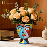 Großhandel Handbemalte Picasso Abstrakte Gesichts-Harzvase Menschlicher Kopf Skulptur Pflanzgefäß Desktop-Ornament Tisch-Blumendekoration