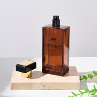Flacon de parfum rectangulaire de luxe avec vaporisateur 100 ml, logo personnalisable et boîte d'emballage disponibles, échantillons gratuits disponibles