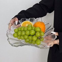 Plateau en verre haut de gamme en forme de pétale, nouveau bol à fruits moderne et minimaliste pour salon, plat à dessert domestique de forme irrégulière