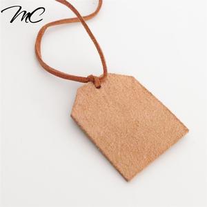 Custom  private logo brown leather label hang tag for handbag luggage jeans hat baseball cap  swing tags patch label - Product Image 6