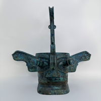 Sanxingdui Bronze tête humaine couronne artefact mis au jour caractéristiques culturelles artistiques uniques ruines artisanat en métal distingué