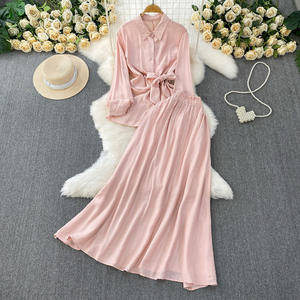 Camisa de protección solar de manga <span class=keywords><strong>larga</strong></span> rosa de estilo suave de verano para mujer <span class=keywords><strong>con</strong></span> <span class=keywords><strong>falda</strong></span> adelgazante de cintura alta de dos piezas <span class=keywords><strong>con</strong></span> patrón sólido - Product Image 1