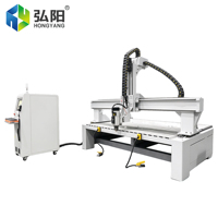 Routeur CNC à tête oscillante 4 axes HJS2612-S4 avec système ATC à engrenages pour la fabrication de moules de sculpture sur bois à surface courbe 3D