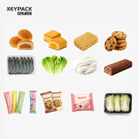 Machine d'emballage flow-pack pour produits de boulangerie avec système d'emballage automatique sous film