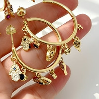 Nouvel ensemble de boucles d'oreilles créoles tendance Nazar avec breloque Hamsa dorée et pavé de pierres, pour femme, porte-bonheur, cadeau idéal pour soirée