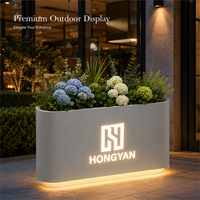 Bac à plantes LED en métal blanc, séparateur de verdure, lumières personnalisables avec logo pour mobilier d'extérieur, cafés - Durable, écologique, pour entrée