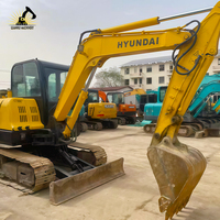 Excavatrice Hyundai 60-7 d'occasion, 5,9 tonnes, compacte, sur chenilles, moteur modèle 2023, pompe hydraulique à vendre
