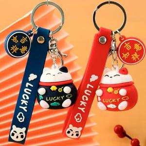 2025 créatif 3D joyeux bagage clé suspendu décoration Couple Anti perte cadeaux en gros Silicone richesse chat cloche porte-clés - Product Image 2
