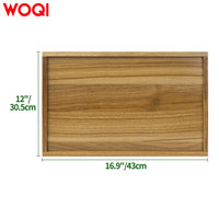 WOQI Plateau de rangement écologique en bambou avec pieds pliants, parfait pour une utilisation avec un ordinateur portable dans le salon.