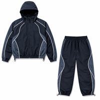 Ensemble de survêtement réfléchissant colorblock inspiré de la course automobile, personnalisé par le fabricant - Veste à capuche et pantalon ample, ensemble streetwear 2 pièces