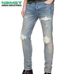 Distressed <b>Light</b> Wash Denim Jeans Manufacturer Ribbed Panel Ripped Slim Fit <b>Trousers</b> Vendor Bulk Production - Product Image 1